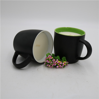 香料入りの無光沢の黒い陶磁器のCitronellaの蝋燭のティー カップの蝋燭
