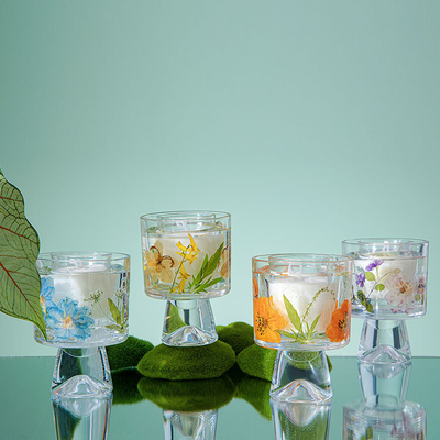 袋が付いている不滅の花ガラスの水晶のコップのアロマセラピーの香料入りの蝋燭を直すVelas