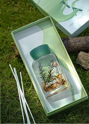 140ml精油の樹脂のふたは袋のローズの花が付いている新しい芳香のReedの拡散器を置いた