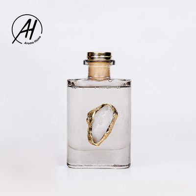 繊維の藤の正方形の金ふたのガラス ビンの精油の香りのReedの拡散器180ML